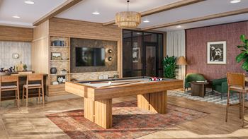 a game room with a pool table and a tv at Lilia, Lilydale, MN